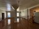 Open concept living room featuring hardwood floors and staircase to another level at 2807 Mcclave Dr, Doraville, GA 30340