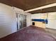 Enclosed sunroom featuring sliding glass doors to the backyard and built in cabinets for your remodeling ideas at 2807 Mcclave Dr, Doraville, GA 30340