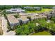 An aerial view shows multi-Gathering residences surrounded by lush landscaping, golf course and beautiful lake at 400 17Th Street Nw # 2313, Atlanta, GA 30363