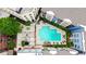 Aerial view of the outdoor pool surrounded by lounge chairs and landscaping at 400 17Th Street Nw # 2313, Atlanta, GA 30363