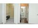 Walk-in closet with shelving and entry into the bathroom at 400 17Th Street Nw # 2313, Atlanta, GA 30363