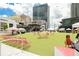 Exterior view of outdoor green space with pink beach chairs for events at 400 17Th Street Nw # 2313, Atlanta, GA 30363