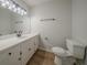 Bathroom with bright countertop, sink, mirror and toilet at 4732 Manly Ct, Stone Mountain, GA 30088