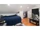 The upstairs bedroom has a walk-in closet, hardwood floors, and a desk area at 1292 Eubanks Ave, East Point, GA 30344