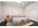 Bedroom with a skylight, neutral colors, and hardwood floors at 1292 Eubanks Ave, East Point, GA 30344