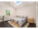 Bedroom featuring a skylight, hardwood floors, and natural light at 1292 Eubanks Ave, East Point, GA 30344