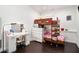 The bedroom includes a bunk bed, vanity, white dresser, and hardwood floors at 1292 Eubanks Ave, East Point, GA 30344