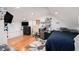 This upstairs bedroom features a TV, and a reading area at 1292 Eubanks Ave, East Point, GA 30344