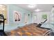 This bonus room features lots of natural light and checkerboard floors at 1292 Eubanks Ave, East Point, GA 30344