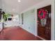 Charming porch with a swing, stylish front door with a wreath, and well-maintained flooring at 1292 Eubanks Ave, East Point, GA 30344