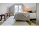 Cozy bedroom with a soft rug, bench and a window bringing in natural light at 2007 Mount Vernon Pl, Dunwoody, GA 30338