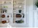 Built-in bookcase featuring decor, objects, and books at 2007 Mount Vernon Pl, Dunwoody, GA 30338