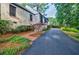 Front exterior view of a brick home showing the driveway entrance at 2007 Mount Vernon Pl, Dunwoody, GA 30338