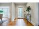 Inviting foyer with hardwood floors, a stylish console table, and a bright, welcoming atmosphere at 2007 Mount Vernon Pl, Dunwoody, GA 30338