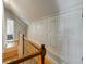Hallway with hardwood floors, staircase, and large storage closets at 2007 Mount Vernon Pl, Dunwoody, GA 30338