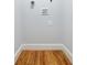 Empty laundry room with wood floors and connections for washer and dryer at 2007 Mount Vernon Pl, Dunwoody, GA 30338