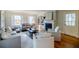 Stylish living room with a cozy fireplace, built-in shelving, and comfortable seating at 2007 Mount Vernon Pl, Dunwoody, GA 30338