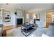 Cozy living room features a fireplace, built-in shelving, and neutral decor creating a relaxing atmosphere at 2007 Mount Vernon Pl, Dunwoody, GA 30338