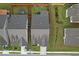Aerial view of two homes with fenced backyards at 2292 Knob Creek Rd, Snellville, GA 30078