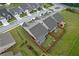 Aerial view of landscaped backyards and community at 2292 Knob Creek Rd, Snellville, GA 30078
