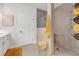 Modern bathroom featuring a large tile shower and bright, natural light at 2292 Knob Creek Rd, Snellville, GA 30078