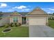 Charming one-story home with manicured lawn and two-car garage at 2292 Knob Creek Rd, Snellville, GA 30078