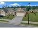 Well-kept one-story home features a manicured lawn and two-car garage at 2292 Knob Creek Rd, Snellville, GA 30078