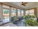 Charming sunroom with tiled floors and lots of bright, natural light at 2292 Knob Creek Rd, Snellville, GA 30078