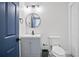 Bathroom featuring new vanity, lighting, and fixtures at 4167 Oakwood Way, Duluth, GA 30096