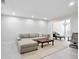 Spacious living area with a comfortable couch and an open layout at 4167 Oakwood Way, Duluth, GA 30096