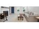 Living room featuring a cozy fireplace, modern decor, and plenty of natural light at 4167 Oakwood Way, Duluth, GA 30096