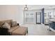 Cozy living space with neutral tones, recessed lighting, and access to the kitchen at 4167 Oakwood Way, Duluth, GA 30096