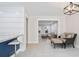 Cozy eat-in kitchen/living room with stainless appliances and modern light fixture at 4167 Oakwood Way, Duluth, GA 30096