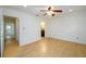 Bedroom featuring hardwood floors, a ceiling fan and an ensuite bathroom at 7500 Roswell Rd # 18, Sandy Springs, GA 30350
