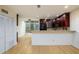 Contemporary kitchen showcases stainless steel appliances, breakfast bar, and bright natural lighting at 7500 Roswell Rd # 18, Sandy Springs, GA 30350