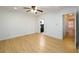 Inviting living room with hardwood flooring, ceiling fan, and open doorway providing a spacious feel at 7500 Roswell Rd # 18, Sandy Springs, GA 30350