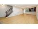 Spacious living area flows into a sunroom and kitchen, enhanced by hardwood floors and natural light at 7500 Roswell Rd # 18, Sandy Springs, GA 30350