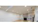 Bright living room with fireplace, hardwood floors, and recessed lighting, showcasing a spacious and modern design at 7500 Roswell Rd # 18, Sandy Springs, GA 30350
