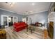 Spacious lounge area with hardwood floors, a fireplace, and gym access promoting a comfortable community space at 7500 Roswell Rd # 18, Sandy Springs, GA 30350