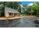 Community pool area with lounge chairs surrounded by lush greenery, creating a relaxing oasis at 7500 Roswell Rd # 18, Sandy Springs, GA 30350