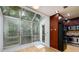Bright sunroom connecting to a modern kitchen, featuring large windows with natural light at 7500 Roswell Rd # 18, Sandy Springs, GA 30350