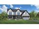 Charming two-story home featuring a well-manicured lawn, inviting entryway, and attached garage, blending comfort and convenience at 1188 Ridgeview Rd, Woodstock, GA 30188