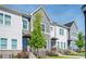 Attractive townhome row highlighting contemporary facade, manicured lawn, and an inviting neighborhood vibe at 1947 Drew Nw Dr, Atlanta, GA 30318