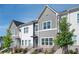 Well-maintained townhome exterior showcasing modern design, tidy landscaping, and inviting curb appeal at 1947 Drew Nw Dr, Atlanta, GA 30318