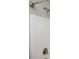 Shower featuring bronze fixtures, a white tiled shower and glass door at 1947 Drew Nw Dr, Atlanta, GA 30318