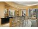 Wet bar with seating and modern lighting at 285 Centennial Olympic Park Nw Dr # 809, Atlanta, GA 30313