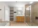 Spacious bathroom featuring a walk-in shower, tub, and a vanity, all enhanced by tile flooring at 285 Centennial Olympic Park Nw Dr # 809, Atlanta, GA 30313