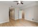 Light-filled bedroom featuring hardwood floors, neutral paint, and a ceiling fan, offering a serene retreat at 285 Centennial Olympic Park Nw Dr # 809, Atlanta, GA 30313