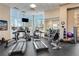 Gym with treadmills, bike, weights and large windows at 285 Centennial Olympic Park Nw Dr # 809, Atlanta, GA 30313