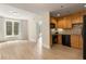Open concept living area with modern kitchen and large windows offering natural light at 285 Centennial Olympic Park Nw Dr # 809, Atlanta, GA 30313